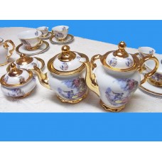 1013 > Aparelhos de chá e café dama com ouro, bules